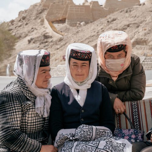 Three women in traditional attire.